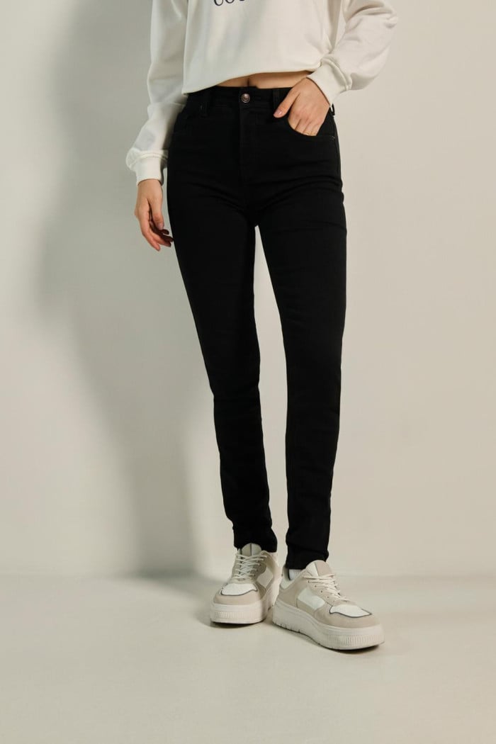 Jean jegging negro tiro alto ajustado con cremallera