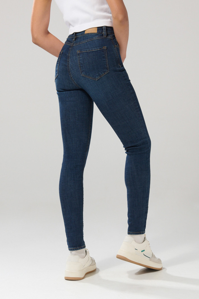 Jean jegging tiro súper alto azul oscuro con ajuste ceñido