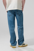 Jean 90´S tiro medio azul con bota ancha y rotos