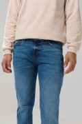 Jean slim 5 bolsillos azul medio con tiro bajo
