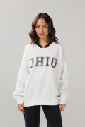Buzo cuello V crema claro oversize con arte college
