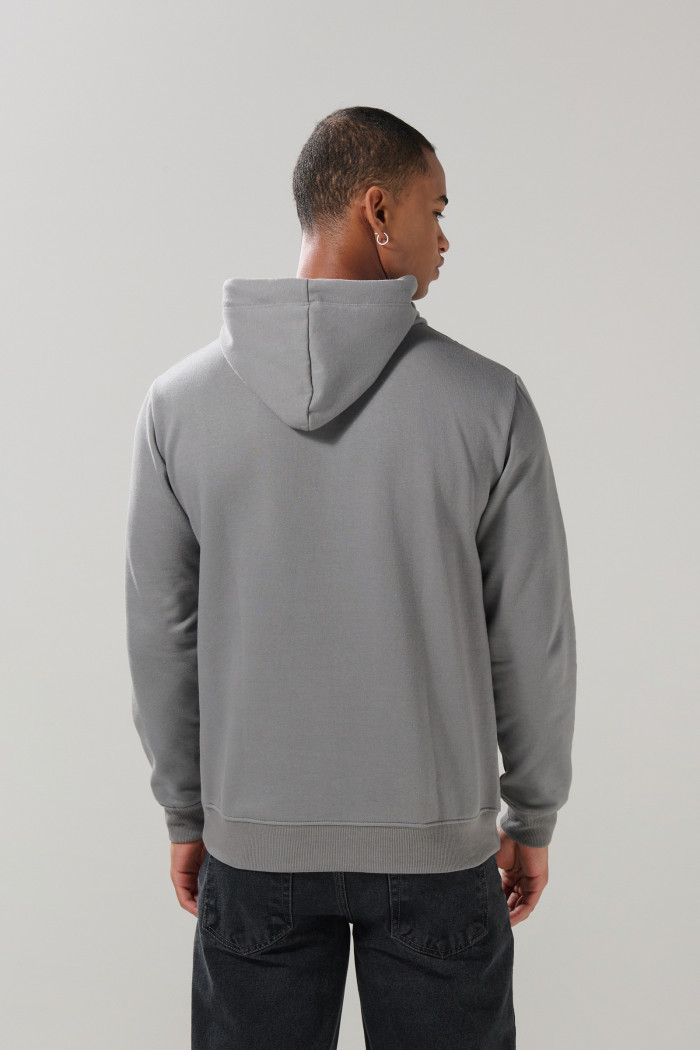 Buzo gris medio con capota y estampado del Rey León