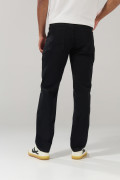 Jean negro slim ajustado con bolsillos y tiro bajo