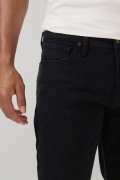 Jean negro slim ajustado con bolsillos y tiro bajo