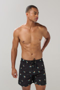 Bermuda playera negra con diseños de surf