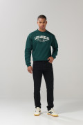 Jean ajustado skinny negro con bolsillos y tiro bajo