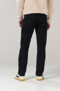 Jean tiro bajo slim negro con cremallera y bolsillos