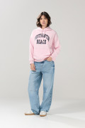 Buzo rosado oversize con arte college y capota