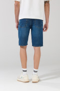 Bermuda de jean slim azul oscura con rotos en frente