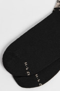 Medias cortas negras con diseño de animal print localizado