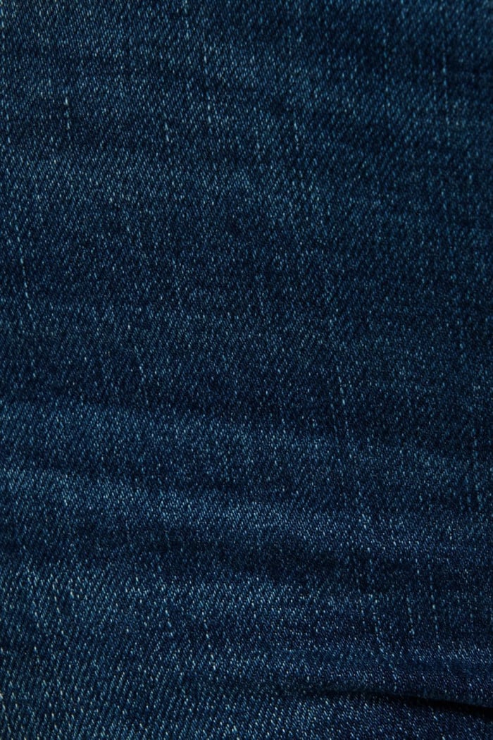 Jean flare azul oscuro con tiro alto y bota campana