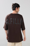 Camiseta oversize manga corta unicolor con diseño posterior