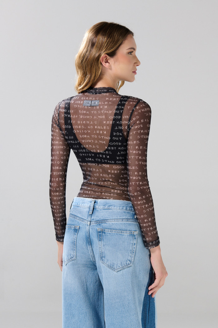 Body manga larga unicolor con textos estampados