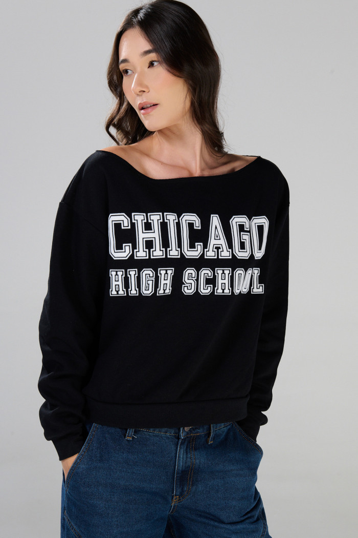 Buzo negro cuello redondo oversize con arte college
