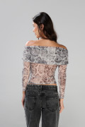 Camiseta crema clara manga larga con diseños animal print