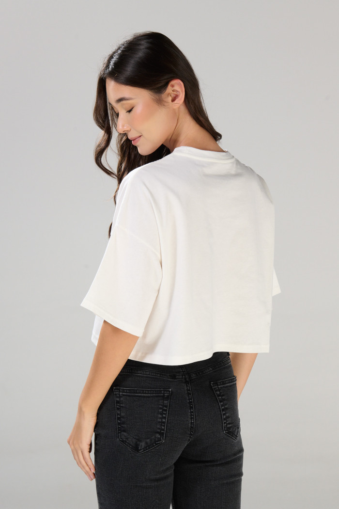 Camiseta oversize crop top crema con diseño de Bob Esponja