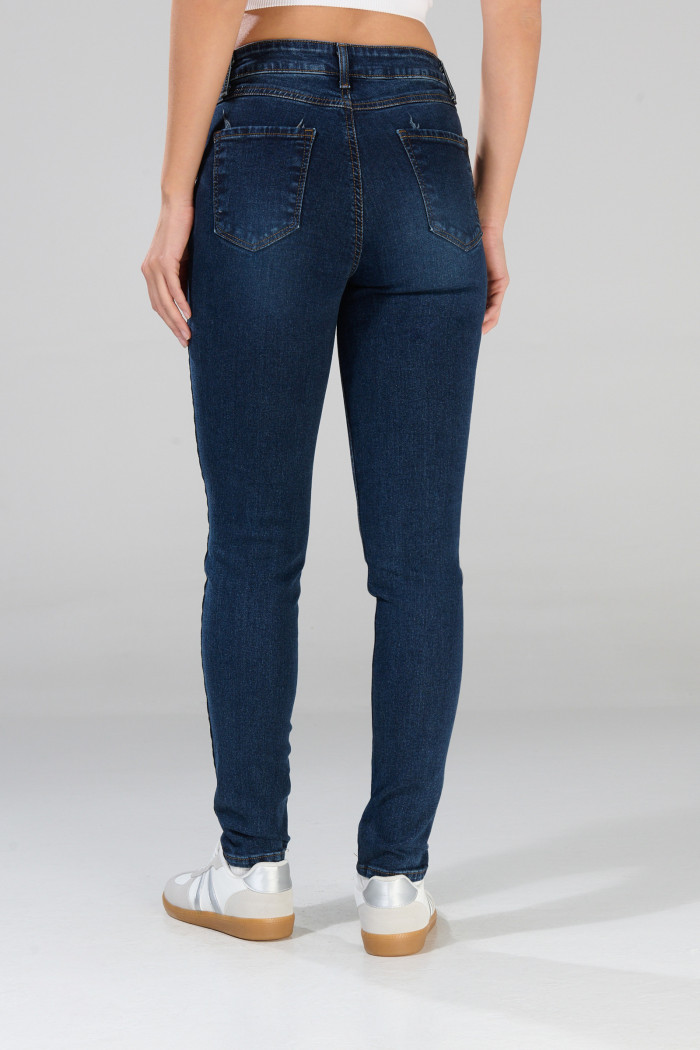 Jean jegging azul oscuro ajustado tiro alto con bolsillos