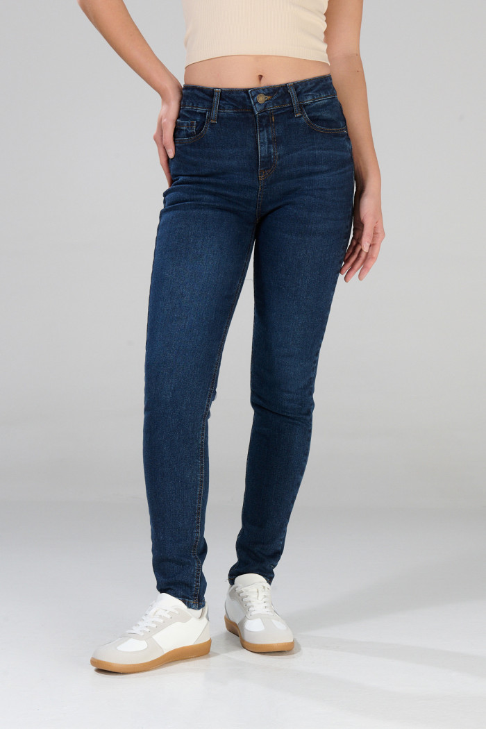 Jean jegging 5 bolsillos azul oscuro con tiro alto