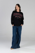 Buzo negro oversize cuello redondo con arte college