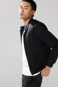 Chaqueta bomber negra con cuello nerú y cremallera