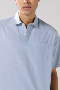 Camisa cuello resort azul con botones en pechera