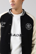 Chaqueta college negra bomber con mangas en contraste