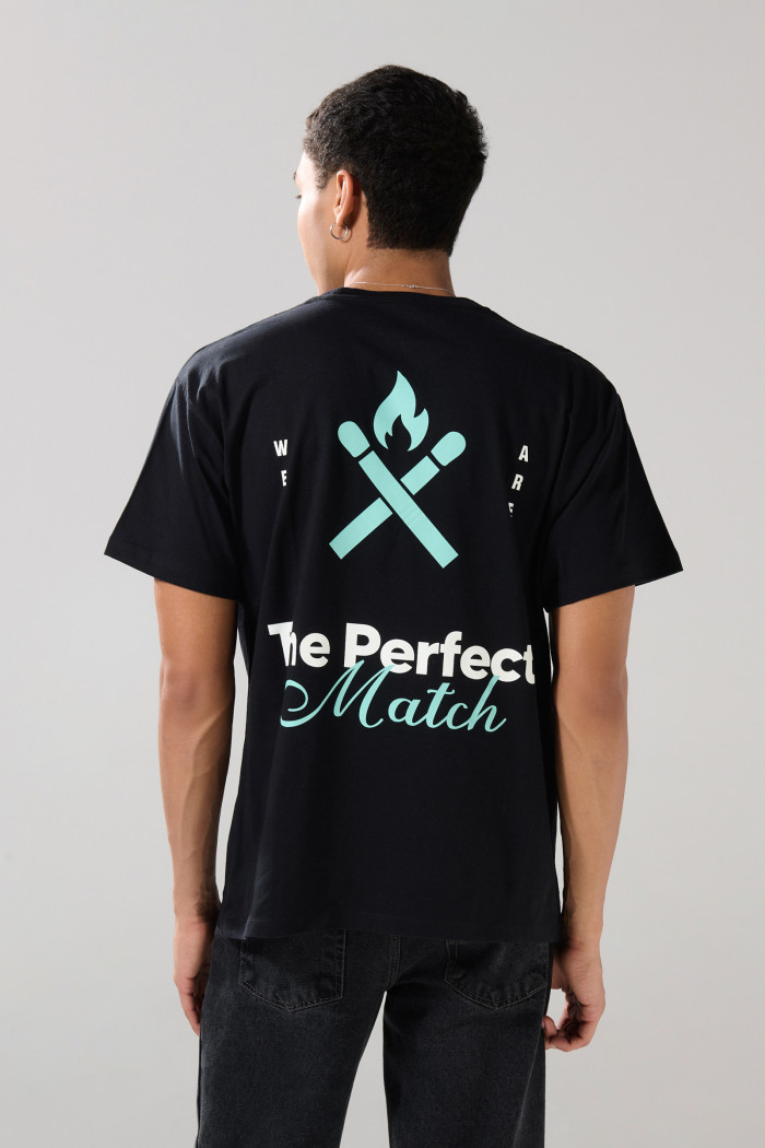 Camiseta unicolor oversize manga corta con textos estampados