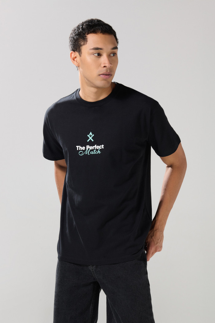 Camiseta unicolor oversize manga corta con textos estampados
