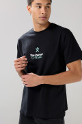 Camiseta unicolor oversize manga corta con textos estampados