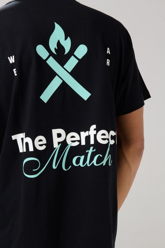 Camiseta unicolor oversize manga corta con textos estampados