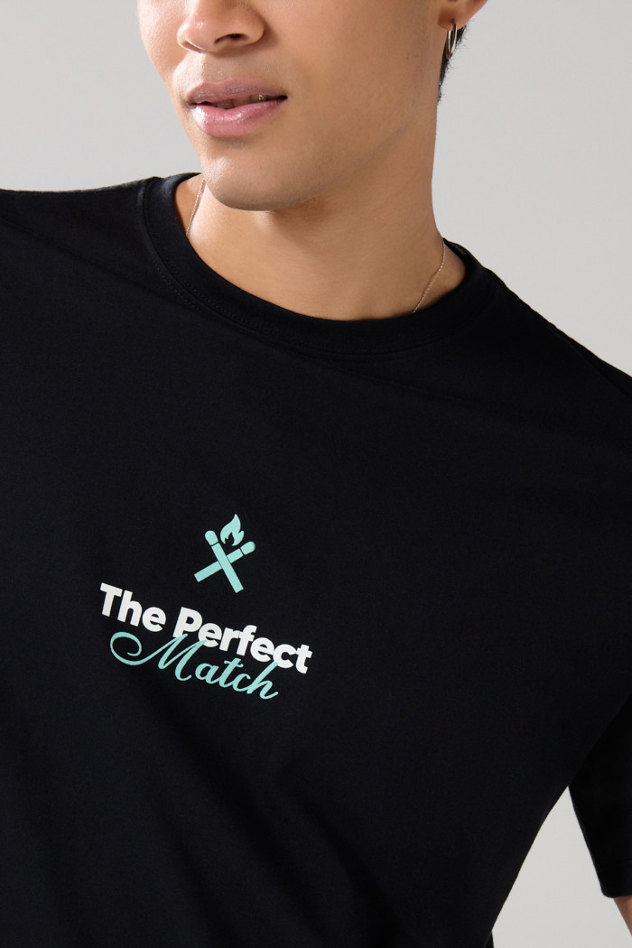 Camiseta unicolor oversize manga corta con textos estampados