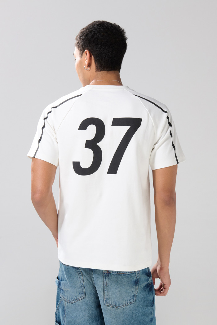 Camiseta manga ranglan college crema clara con rayas