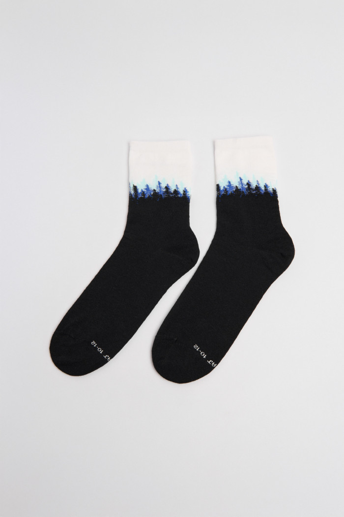 Medias largas azules intensas con diseño de paisaje