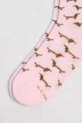 Medias rosadas largas con diseños de perritos salchicha