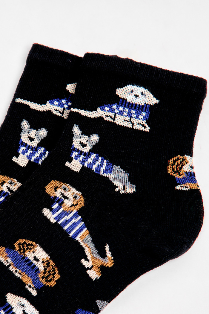 Medias cortas azules intensas con diseños de perritos