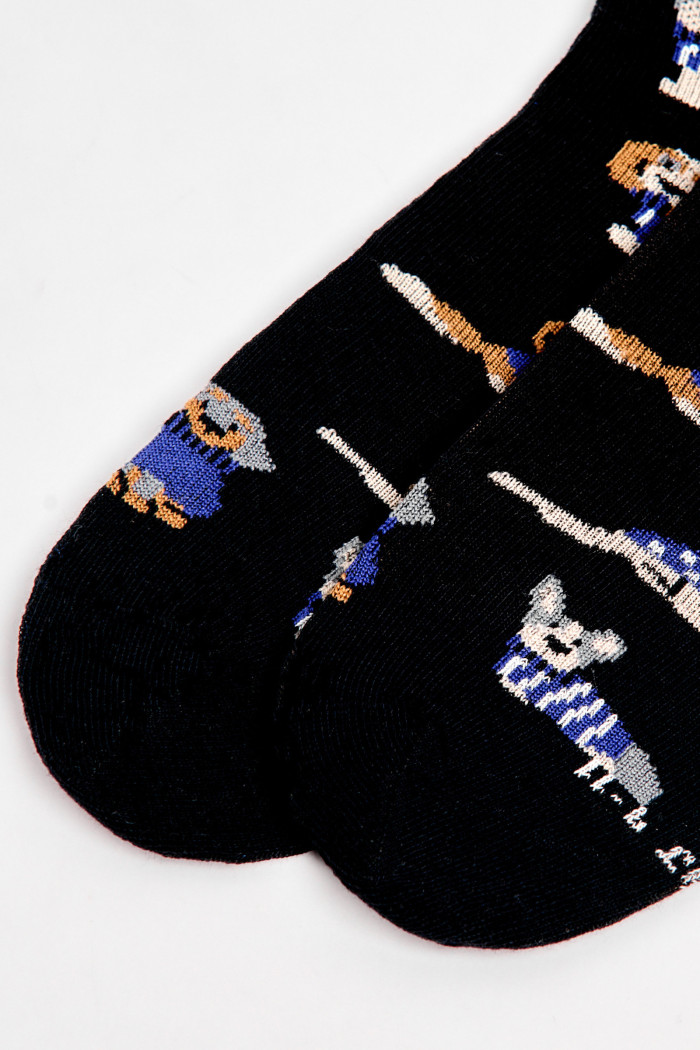 Medias cortas azules intensas con diseños de perritos