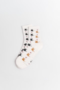 Medias largas unicolores con diseño de gatitos