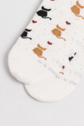 Medias largas unicolores con diseño de gatitos