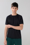 Camiseta unicolor cuello redondo con manga ranglan corta