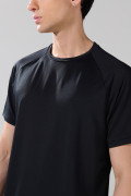 Camiseta unicolor cuello redondo con manga ranglan corta