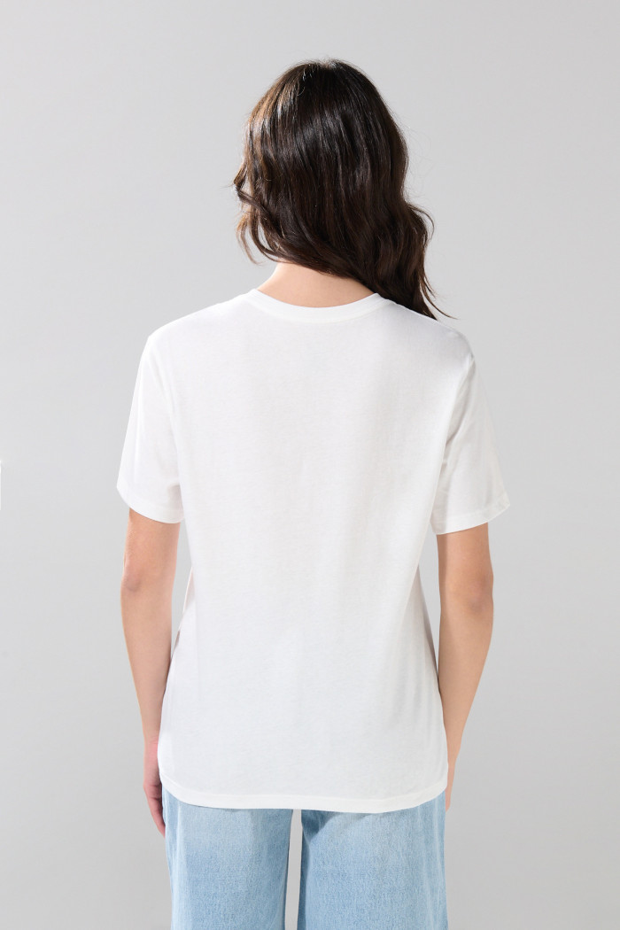 Camiseta crema cuello redondo con diseño de Tom y Jerry