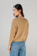Suéter unicolor cuello redondo con texturas localizadas