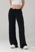 Pantalón tiro medio palazzo negro con bota ancha