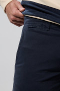 Pantalón de dril slim unicolor con tiro medio y cremallera