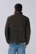 Chaqueta acolchada unicolor cuello alto con efecto sherpa