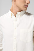 Camisa en algodón manga larga unicolor con botones