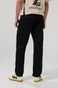 Pantalón unicolor cargo en dril con botas ajustables