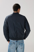 Chaqueta unicolor acolchada bomber con bolsillos