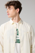 Camisa cuello sport collar unicolor en algodón con bolsillo