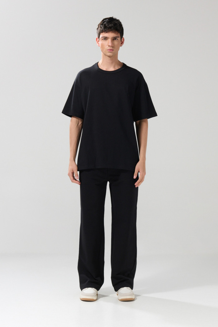 Camiseta oversize unicolor manga corta con hombro caído